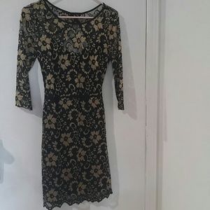 Black and gold lace dress